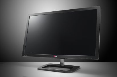 A righ-side view of LG EA83 ColorPrime IPS Monitor in front of a grey background