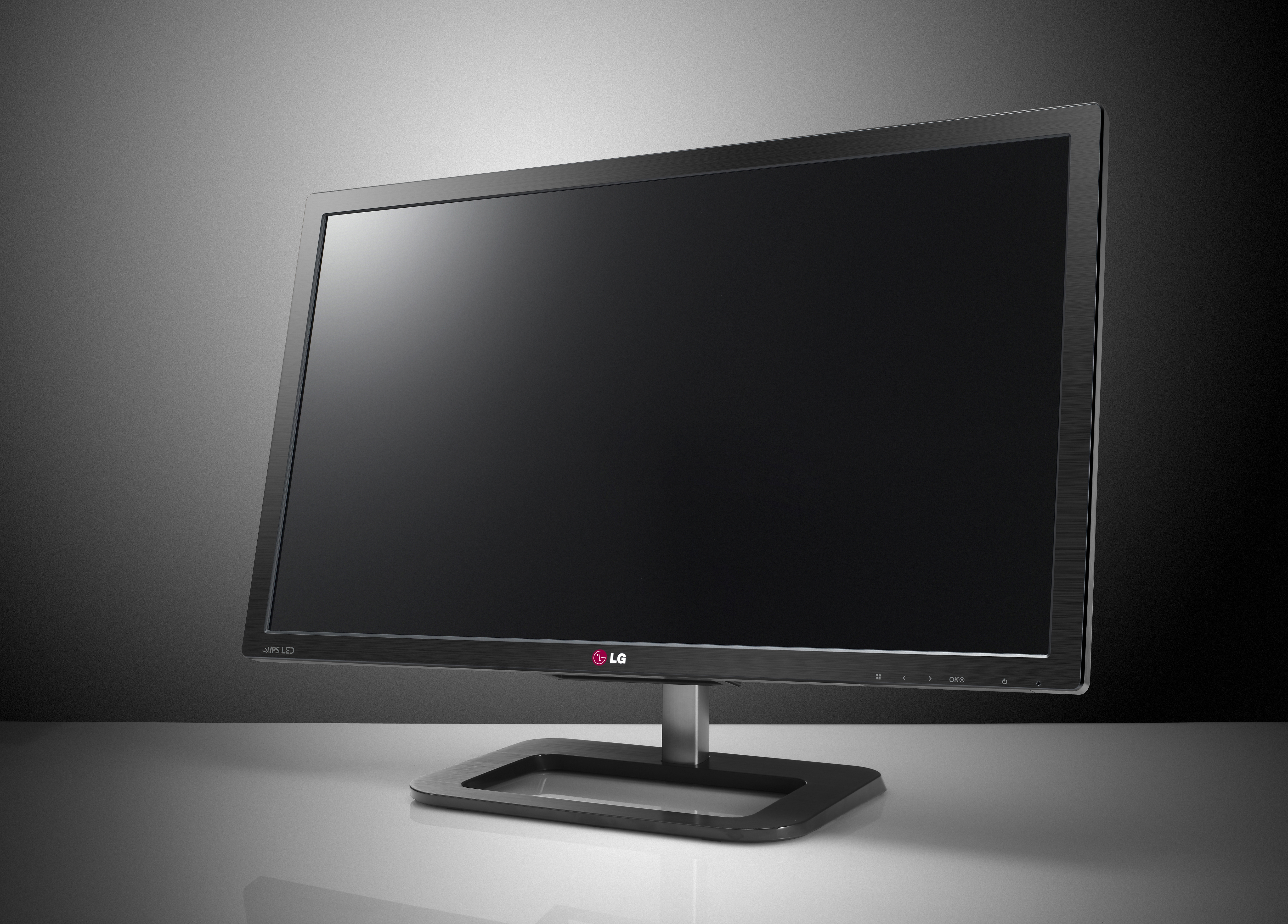 A righ-side view of LG EA83 ColorPrime IPS Monitor in front of a grey background
