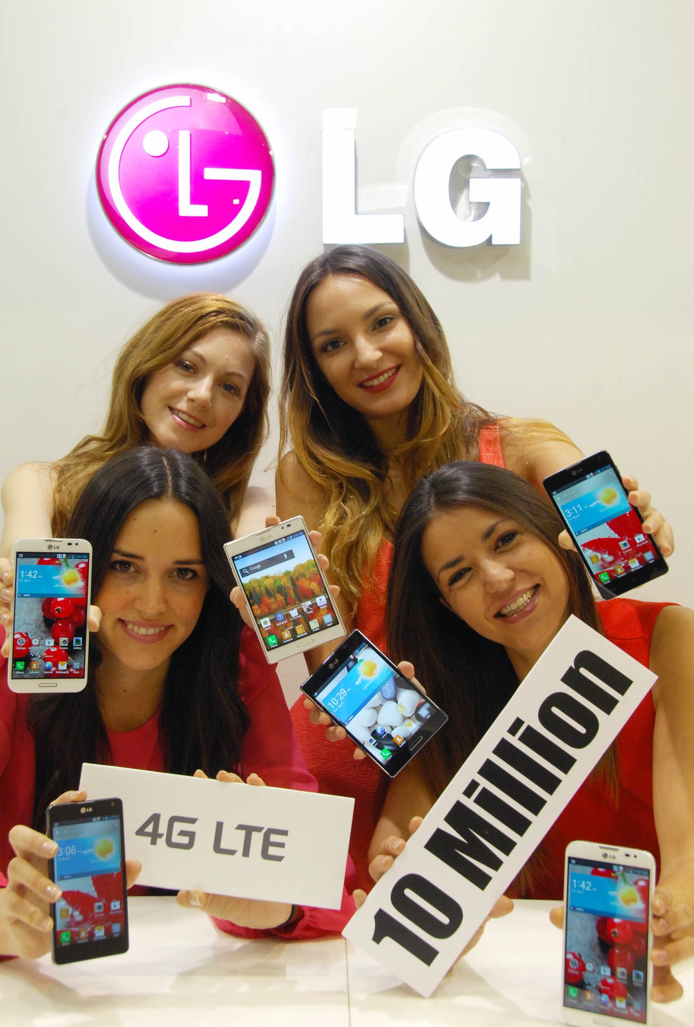 Four female models are holding various LTE smartphone of LG celebrating that LG has sold more than 10 million LTE smartphones worldwide.