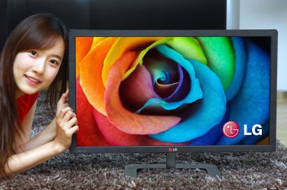 A model posing with LG ColorPrime Monitor model 27EA83
