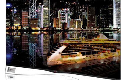 A right-side view of the LG's curved OLED TV model 55EA9800 displaying a night scene of the city