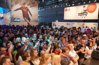 A large audience gathers at the main LG & EA stage at Gamescom 2013