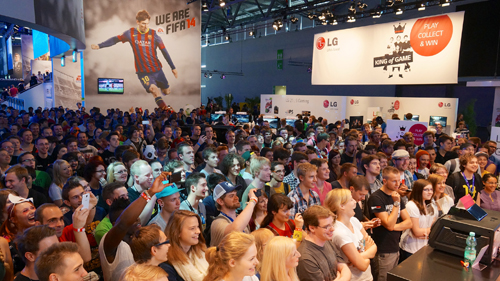 A large audience gathers at the main LG & EA stage at Gamescom 2013.