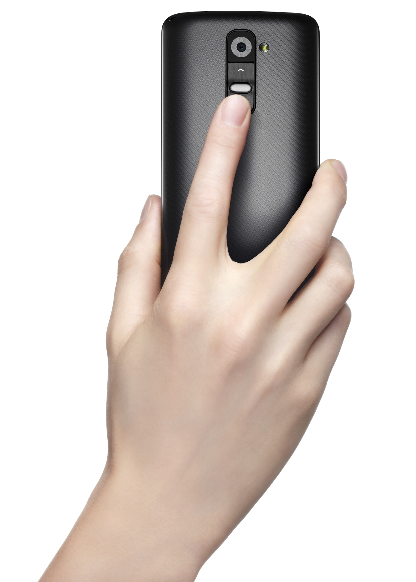 A person’s hand using the rear fingerprint sensor on the back of the LG G2.
