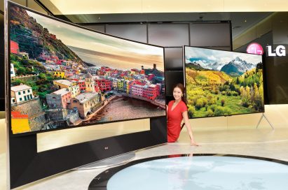 A model demonstrating LG CURVED ULTRA HD TV model UB9800