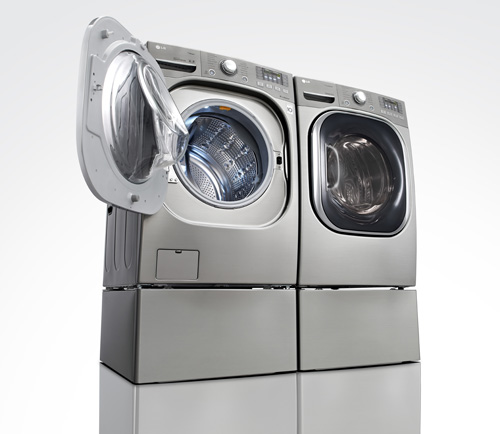 Set of LG front-load washing machine and dryer with drawer at the bottom