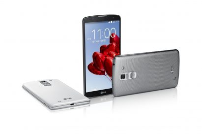 From left to right; The LG G Pro 2 in white face down, in Titan Black color standing upright, and in silver lying on its side.