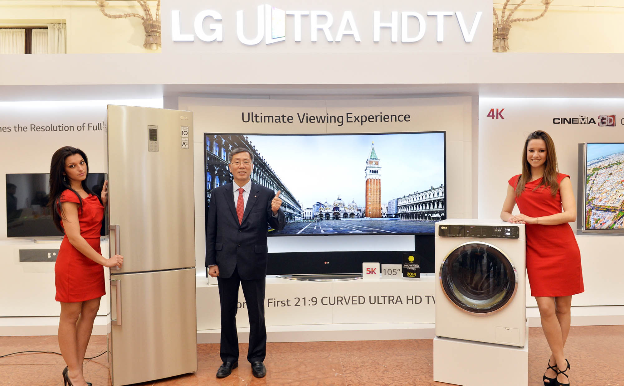 Two models demonstrating LG’s washing machine and refrigerator with vice president and Europe region head at LG Electronics, Brian Na, at LG Innovative Festival Europe