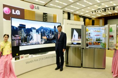 Weon-dae Kim, senior vice president and regional head of LG Electronics Asia, poses with its newest products aimed at Asian consumers.