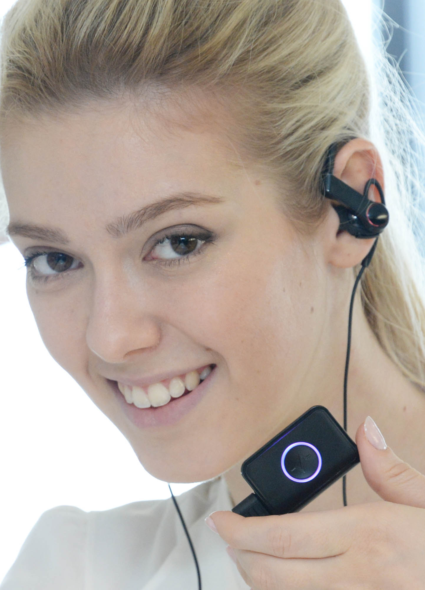 A model using LG’s Heart Rate Earphones