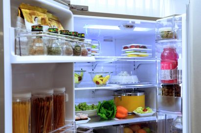 Inside LG’s smart refrigerator with Smart View camera, which is located on the interior’s ceiling. The refrigerator is full of various food including bottles of spices, fruits, vegetable and beverages.