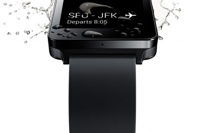 Water drops and spreads on the Titan Black LG G Watch’s screen, which is showing the user’s flight departure details.