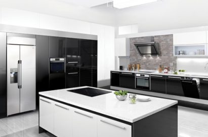 A whole view of kitchen in black and white consisting of LG’s premium built-in kitchen appliances including refrigerator, induction cooktop, oven and dishwasher