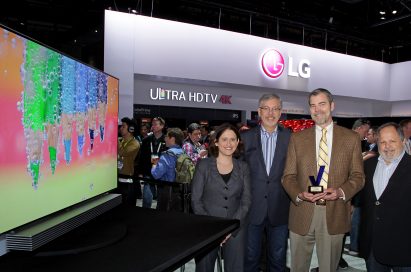 David VanderWaal, director of home appliance brand marketing, LG Electronics USA (third from left), holds one of the awards earned at CES 2015, and takes a group picture with colleagues