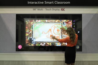 A model demonstrating LG’s 98-inch ULTRA HD Digital Signage at ISE 2015