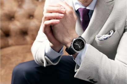 A man holds his hands together while wearing the LG Watch Urbane LTE.