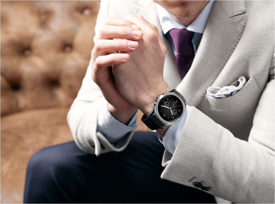 A man holds his hands together while wearing the LG Watch Urbane LTE.