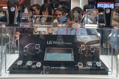 Participants of MWC are looking at LG Watch Urbane at LG booth.