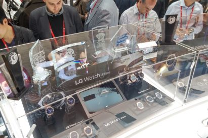 Participants of MWC are looking at LG Watch Urbanes at LG booth.
