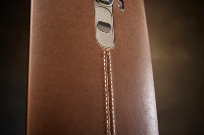 A back view of LG G4 wearing brown leather cover from low to high view.