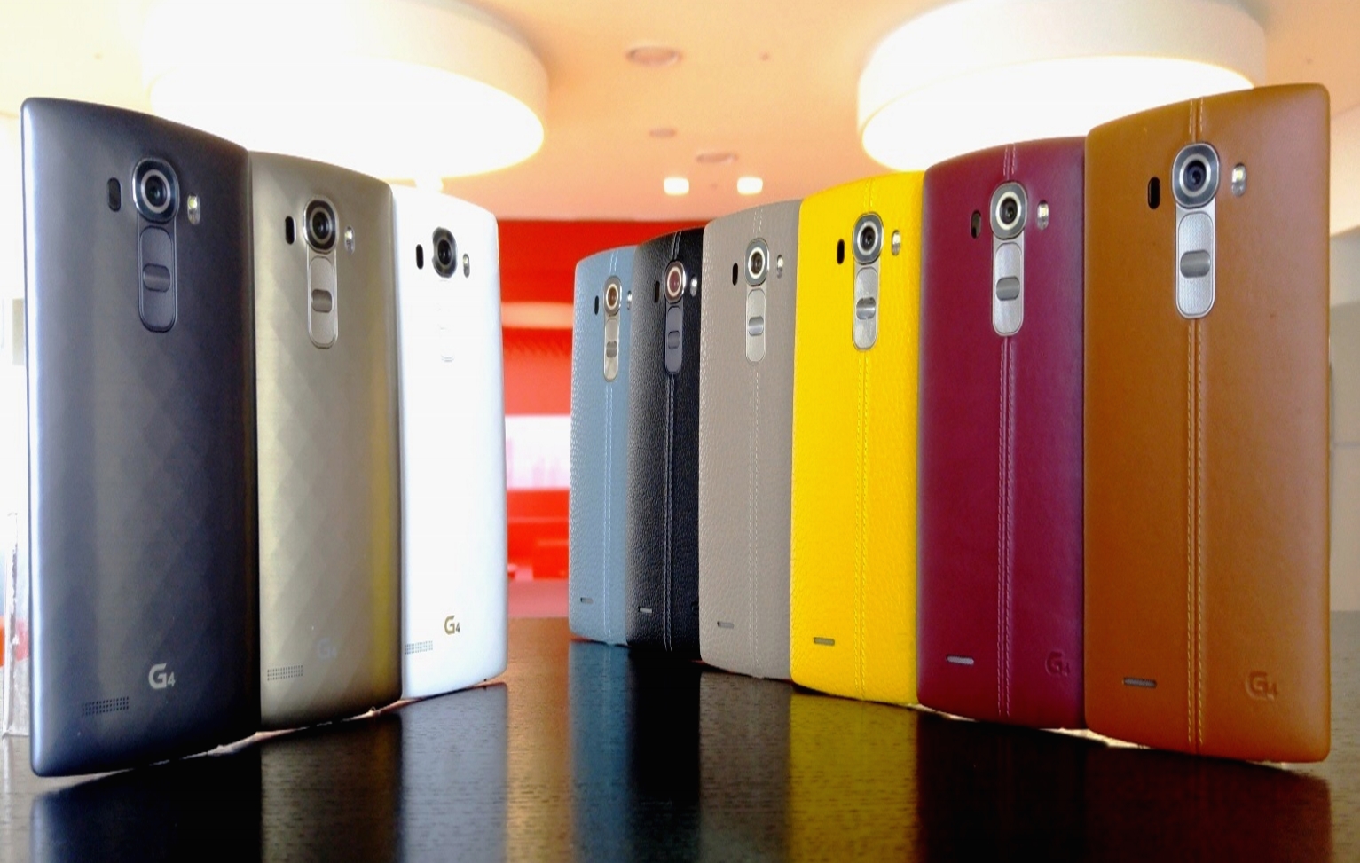 LG G4 handsets wearing three unique material covers in three colors(Metallic Gray, Shiny Gold, Ceramic White) with 3D patterns and handcrafted, genuine full grain leather back cover in six colors(Sky Blue, Black, Beige, Yellow, Red, Brown)