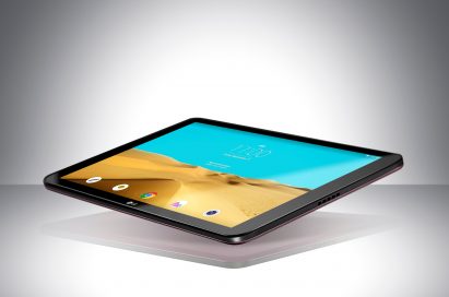 A LG Pad II 10.1 is floating in the air with its screen on above a table.