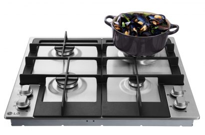 LG Studio gas cooktop with a cooking pot on the right upper section