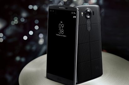 Two LG V10s in Space Black standing on a table, showing the front and back view of the device