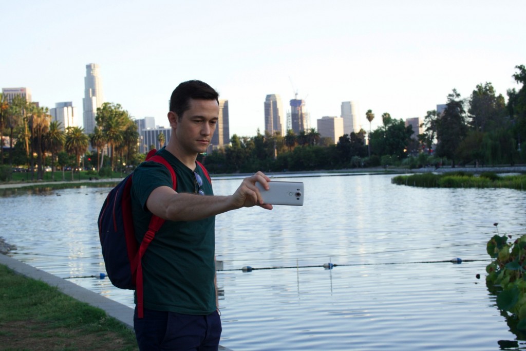 American actor, writer and director Joseph Gordon-Levitt takes a picture with the LG V10