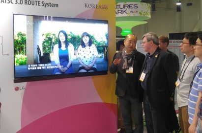 Visitors to LG’s booth at the 2016 National Association of Broadcasters (NAB) convention observe and discuss the company’s ATSC 3.0 smart antenna.