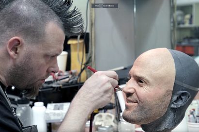 A man airbrushes a face mask of Jason Statham used during filming of LG G5 TV Commercial, ‘World of Play’