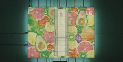 The completed display, made of bulbs from LG Centum System™ refrigerator, showing various fruit and the LG logo