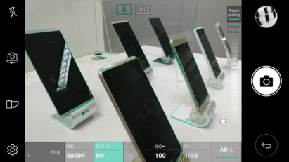 Several LG V20’s displayed at an angle; image is framed by LG V20 camera interface with Focus Peaking feature on