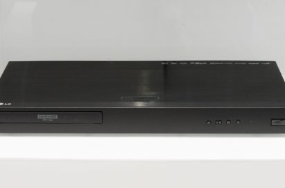 Front view of the LG UP970 Ultra HD Blu-ray player on a white table