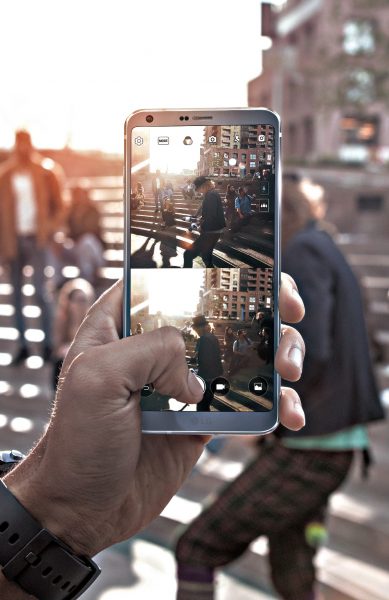 A person taking a Snap Shot of a man juggling with the LG G6’s Square Camera Mode