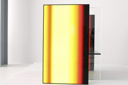 A front close-up of one of the OLED panel installations found inside Tokujin Yoshioka’s art exhibition, currently displaying vibrant yellows and reds.