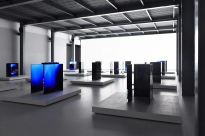 A wide-angle view of many of the installations found inside Tokujin Yoshioka’s art exhibition in a dark setting, equipped with the latest LG OLED display technology