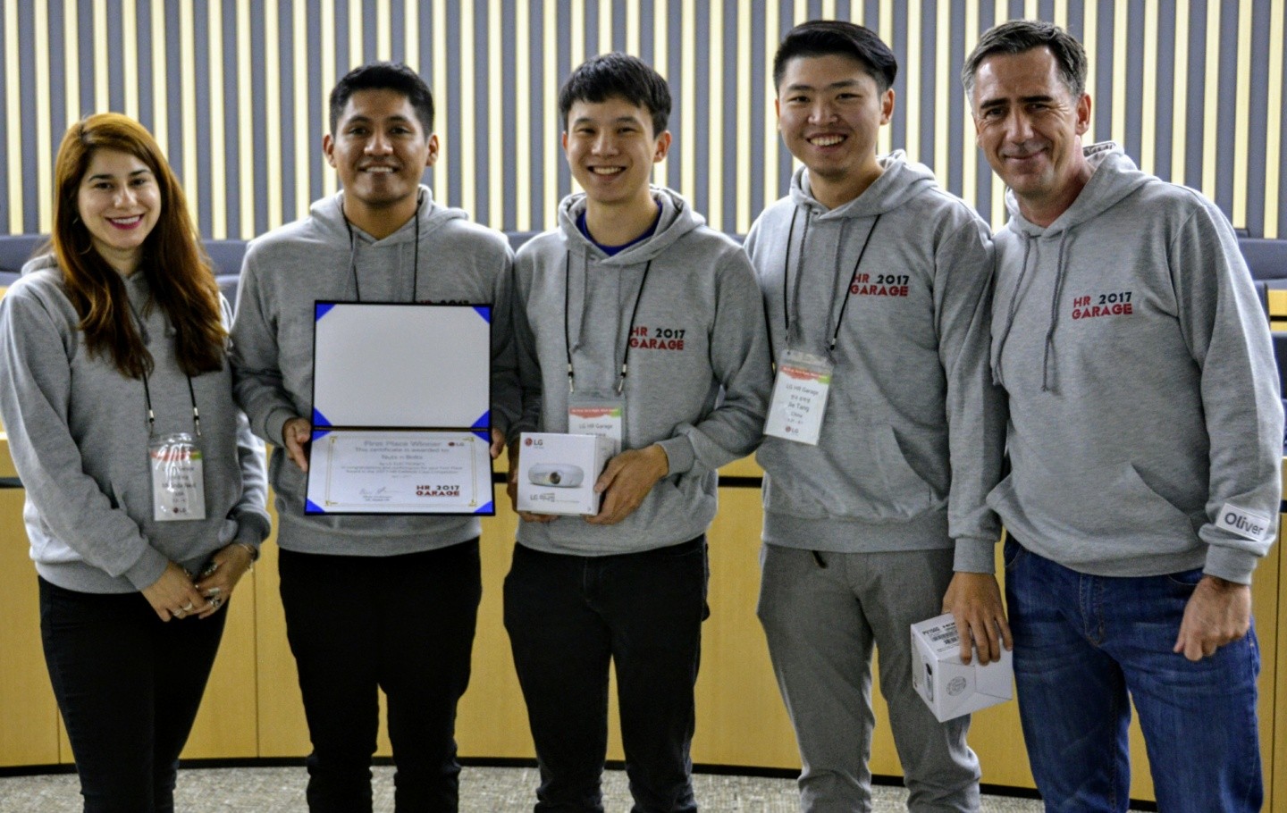 Winners of LG HR Garage competition pose with their award and prizes