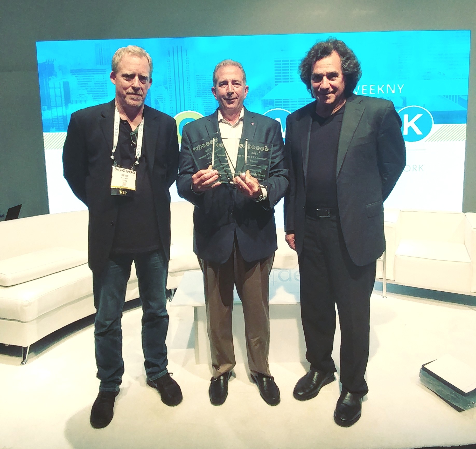 Officials of LG and CE Week are presenting three ‘2017 King of TV’ plaques at the 14th Annual CE Week TV Shootout