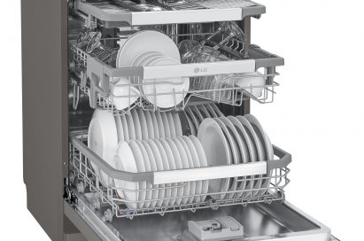 LG SteamClean™ dishwasher completely open and filled with various clean dishes on the three racks.
