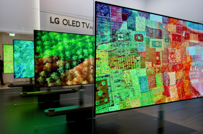Several LG SIGNATURE OLED TV W television sets on display at LG’s booth during IFA 2017