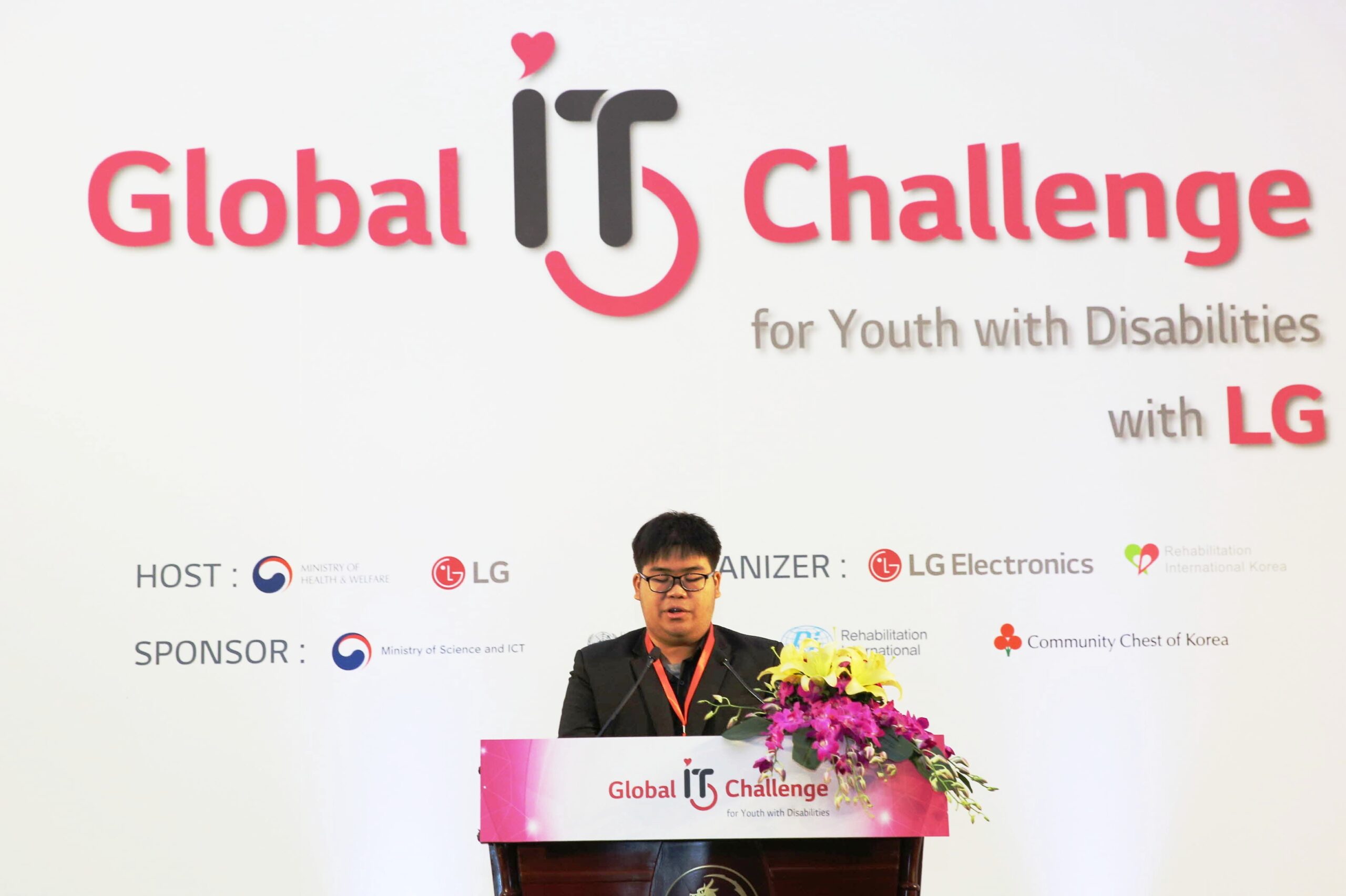 The winner makes a speech after receiving his award.