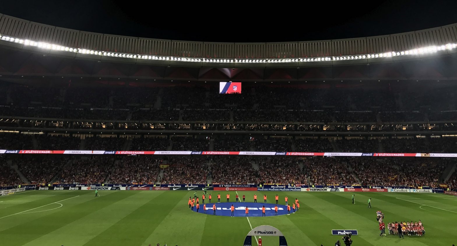 A wide view of Atletico de Madrid’s football stadium with LG’s signage in the background