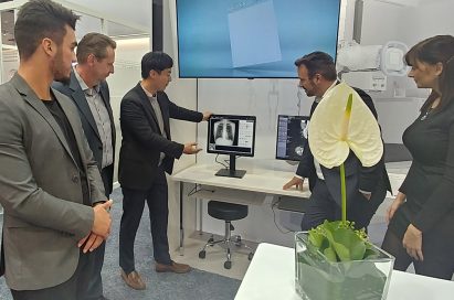 An LG representative demonstrates LG Medical Monitors to medical professionals at Medica 2017