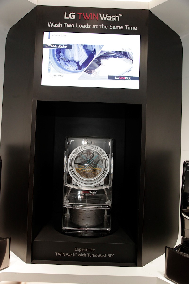 The LG TWINWash washer display features a transparent model, giving visitors a closer look inside the appliance and its innovative TurboWash 3D technology