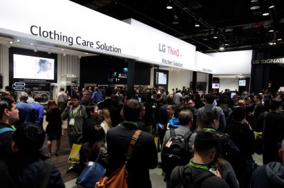 Many visitors taking a walk around LG’s AI-enabled home appliances in the LG ThinQ AI zone of the company’s CES booth