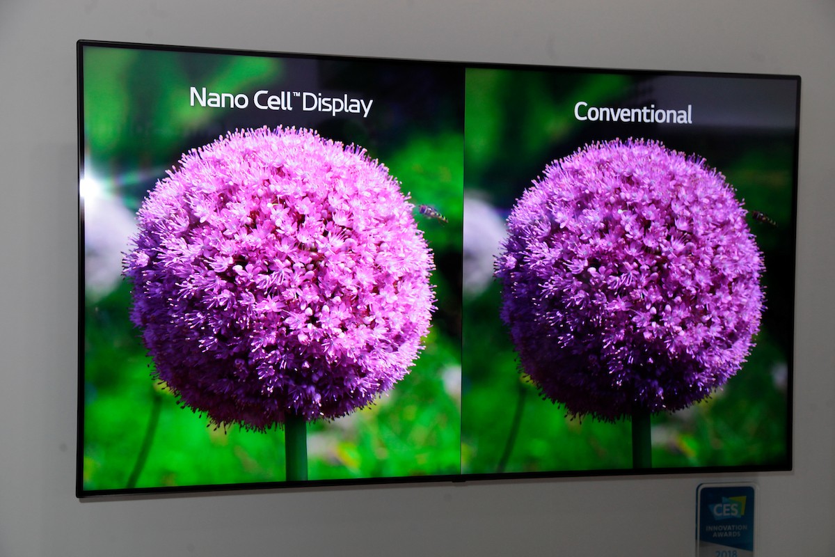 The LG Nano Cell SUPER UHD TV display compares two flower images side-by-side to showcase the superior imagery that comes with Nano Cell technology.
