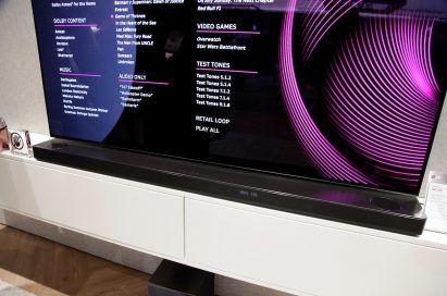 Front view of the LG SoundBar SK10Y placed below an LG TV