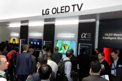 Many visitors taking a walk around the LG OLED TV zone of the company’s CES booth