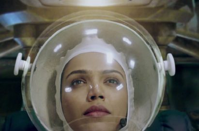 A screenshot of LG India’s “Astronaut” video, a woman wearing the astronaut suit is waiting for the departure of the spaceship.